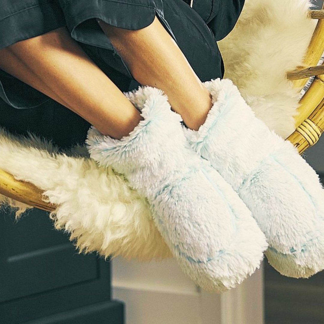 Female wears microwave slippers