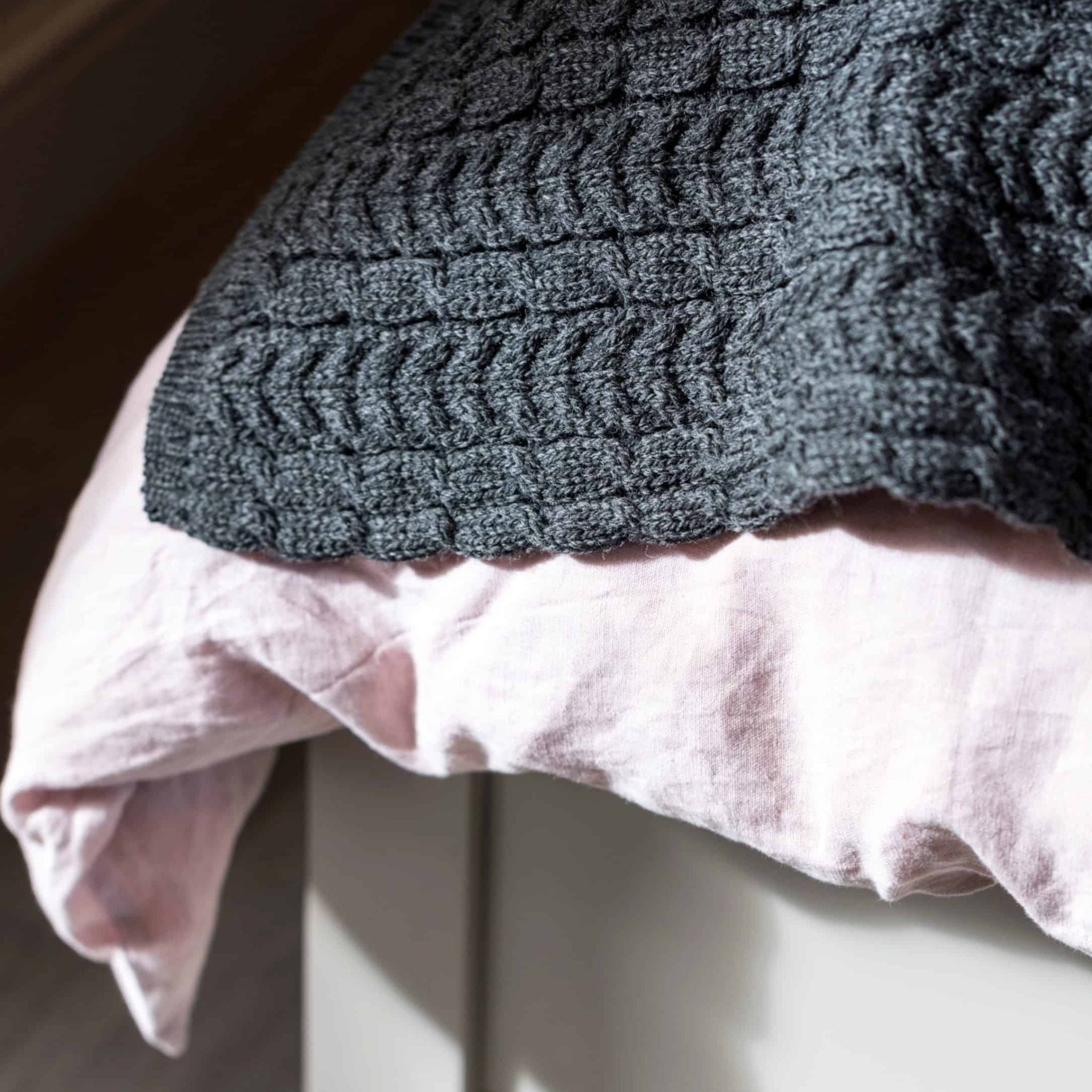 Charcoal Grey 100% Merino Wool Maria Knitted Throw on Bed