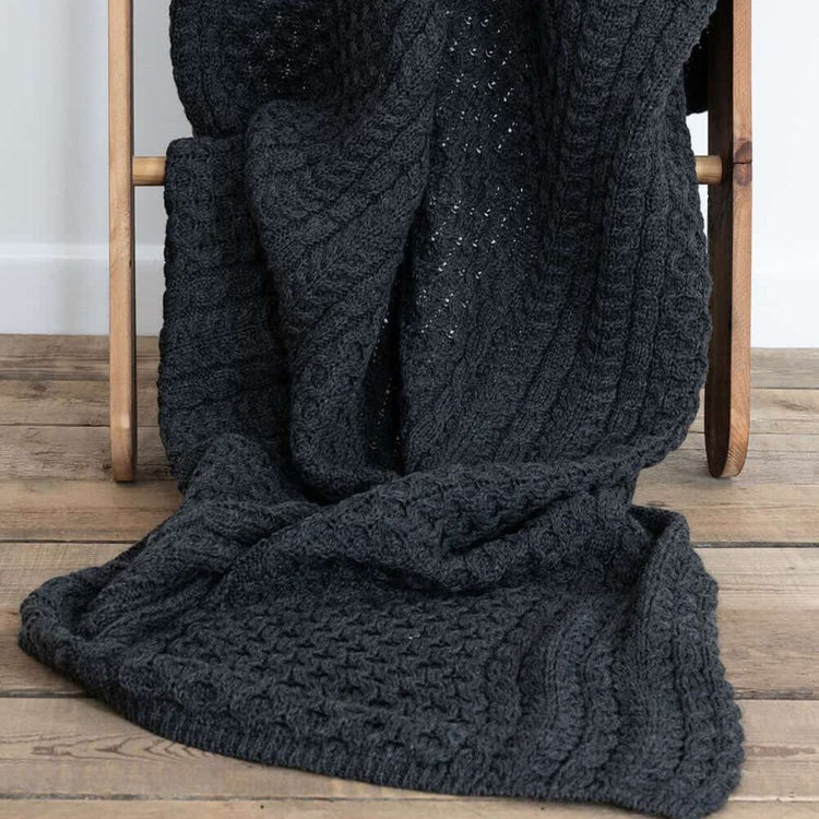 Charcoal Grey 100% Merino Wool Maria Knitted Throw on Step from front